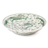 A Chinese porcelain famille verte dragon dish, painted throughout with five dragons