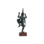 A large Thai bronze figure of Vishnu, standing on one leg, each of the four arms with attributes