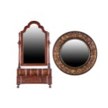A Queen Anne-style walnut toilette mirror with an arched mirror plate over a shaped base fitted with