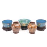 A collection of Chinese cloisonne, 20th century, comprising a pair of steep sided bowls, decorated