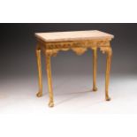 In the manner of James Moore; an early 18th century carved wood and gilt gesso side table with