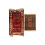 A crimson ground Central (?) Turkish prayer rug with barbed mihrab and broad borders, 85 cm x 140