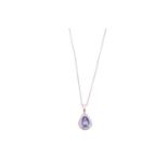 A tanzanite and diamond cluster pendant on chain, featuring a pear-shaped tanzanite of 8.3 x 5.6 mm,