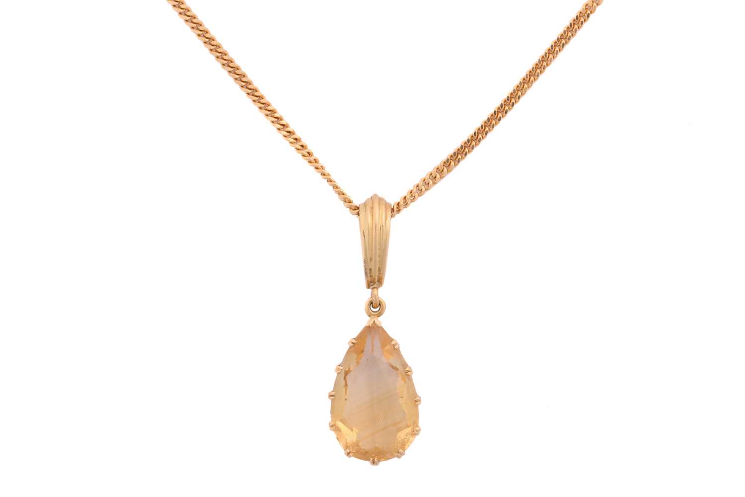 A citrine pendant on chain, comprising a pear-shaped citrine of pale orangey-yellow colour,