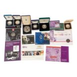 A collection of silver proof coins, including 2015 The Longest Reigning Monarch crown, 2012