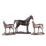 In the manner of Pierre Jules Mene (1810-1878) a group of three cast and patinated bronze figures of