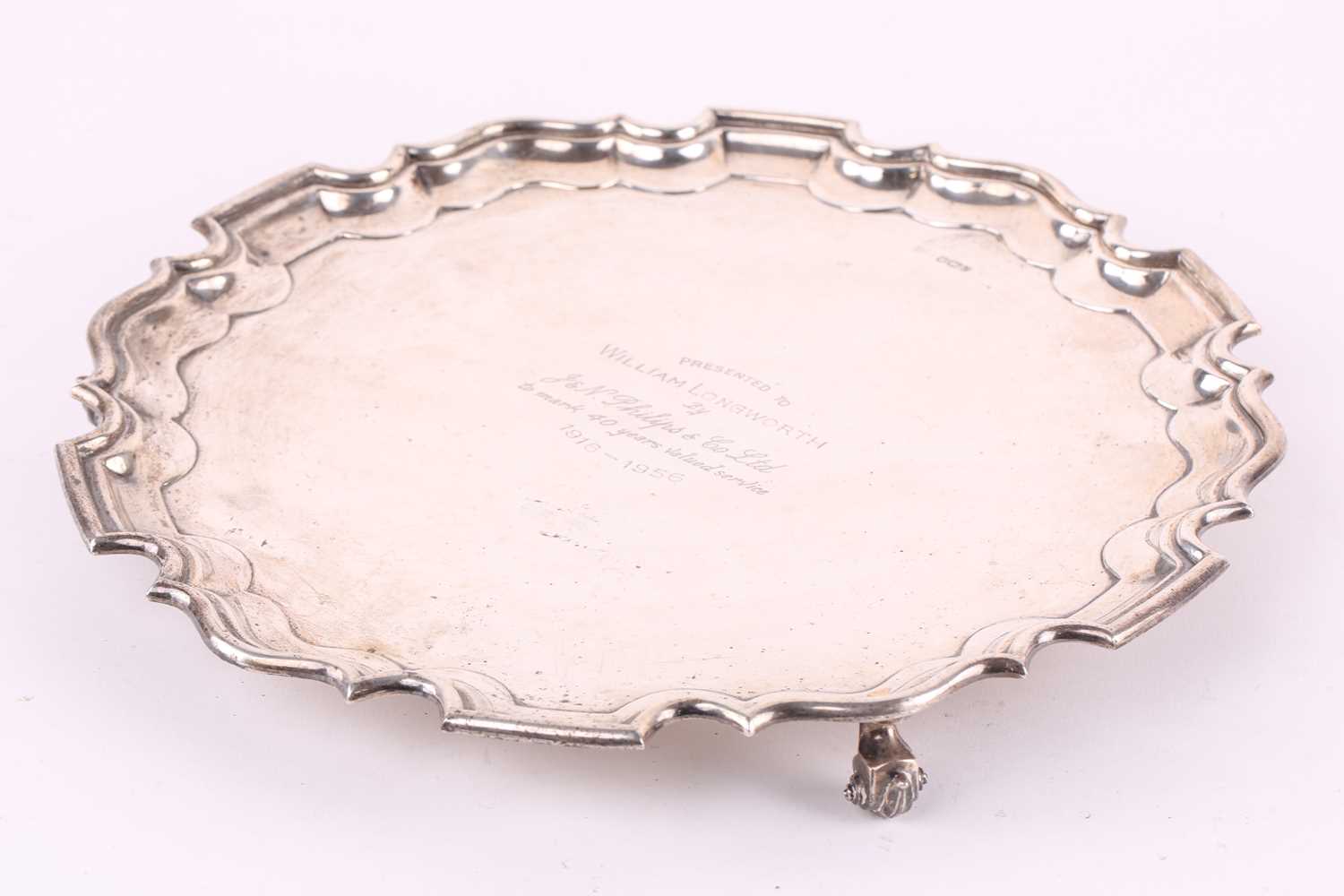 A large silver salver, Walker & Hall, Sheffield 1956, with moulded border, on three foliate capped - Image 2 of 6