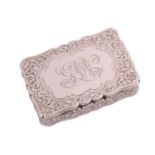 A Victorian silver snuff box of shaped rectangular form allover decorated with scrolling flowering