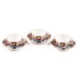 A group of three Worcester porcelain "Kakiemon" pattern tea cups and saucers, c 1770s, with shaped