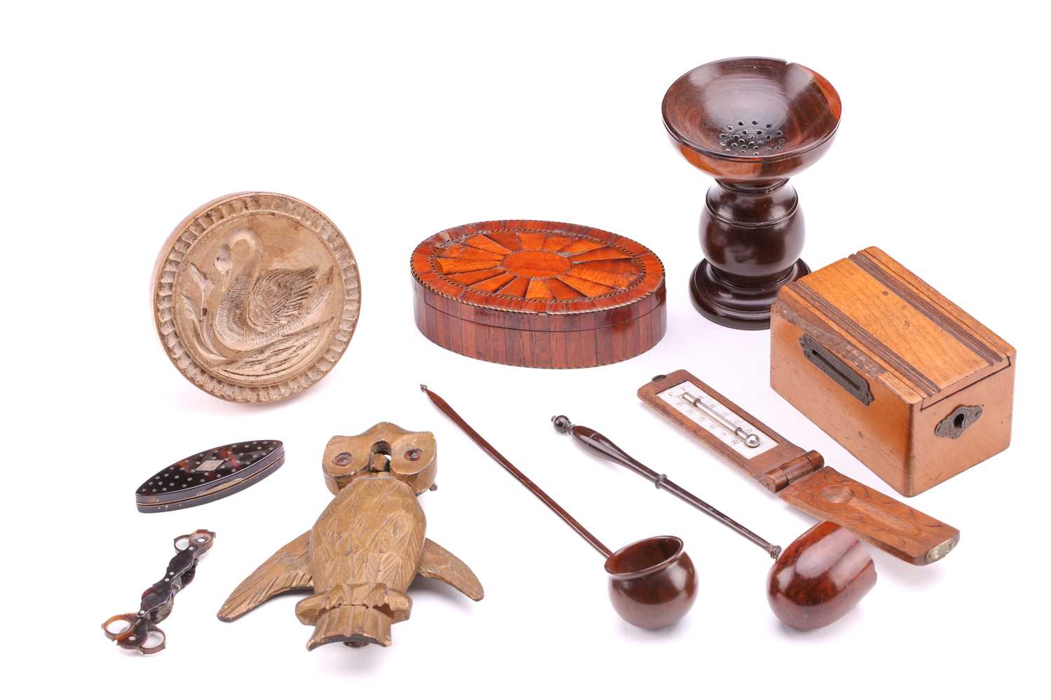 A collection of treen items including an 18th-century style turned lignum vitae pounce pot with