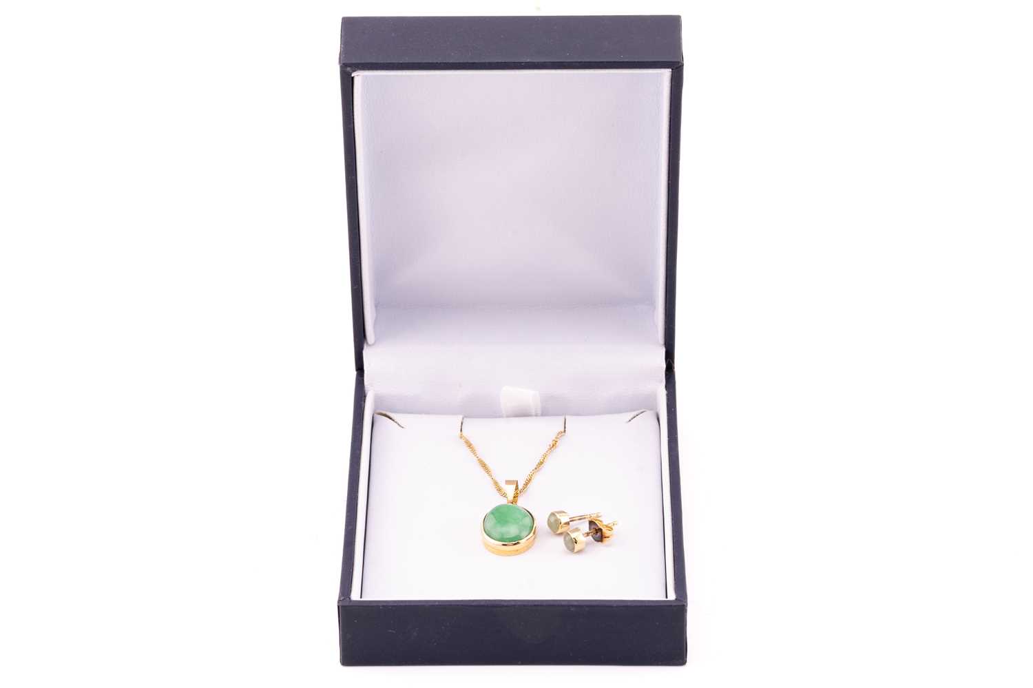 A jade pendant on chain with a pair of stud earrings in 18ct yellow gold; the pendant contains an - Image 2 of 10