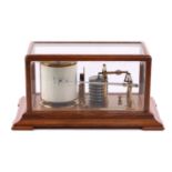 An oak-cased barograph by Becker of London with moulded base and bracket feet. 37 cm long x 23 cm