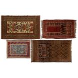 A muted red ground Afghan Belouch prayer rug, 135 cm x 78 cm, together with one other similar prayer