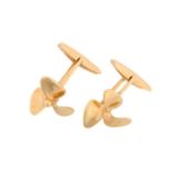 A pair of boat propeller cufflinks, with hinged nautical motifs fitted with triangular cufflink