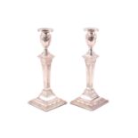 A pair of Victorian classical revival silver candlesticks, Charles Stuart Harris, London 1894,