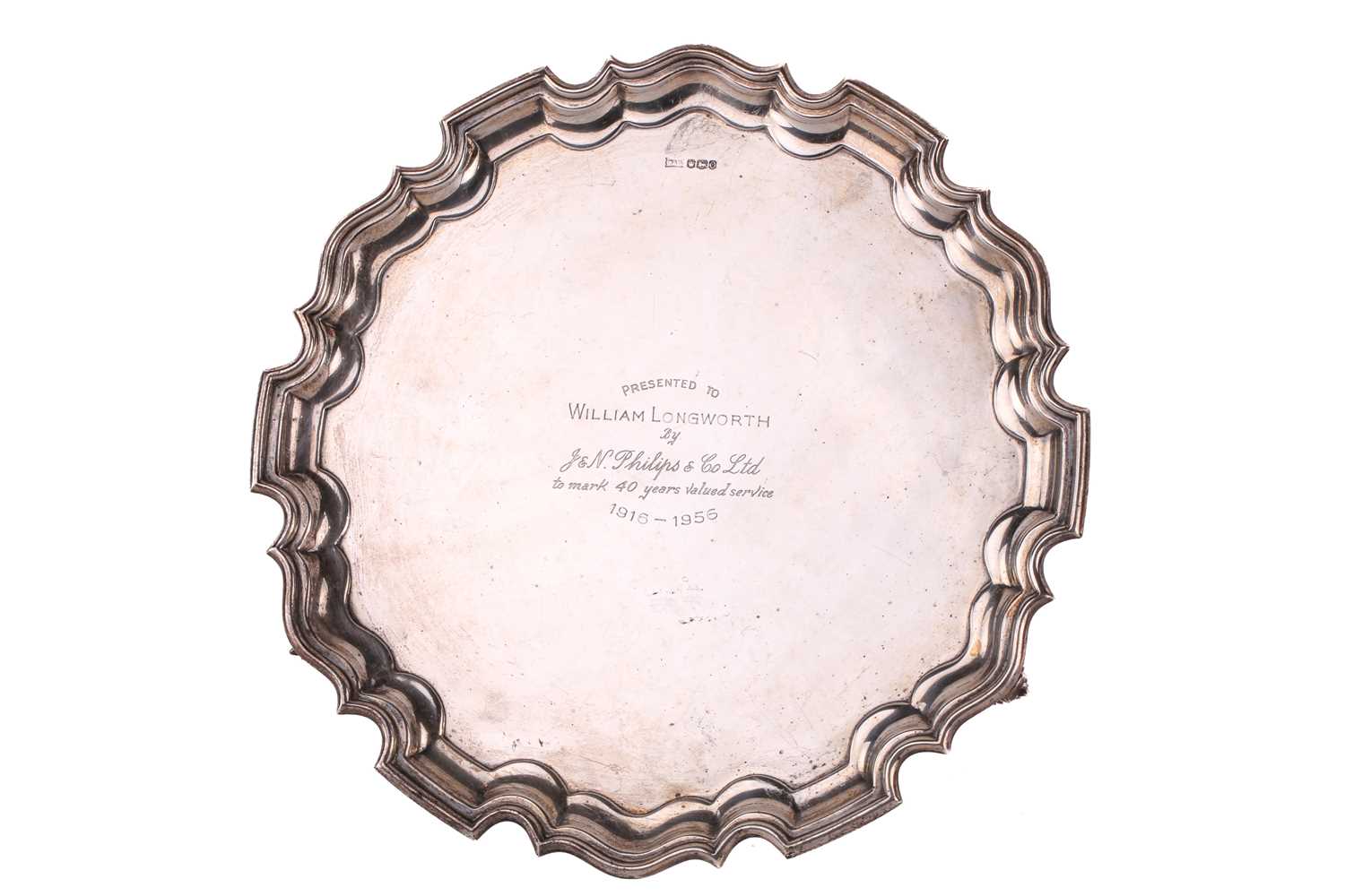 A large silver salver, Walker & Hall, Sheffield 1956, with moulded border, on three foliate capped