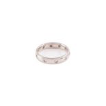 A diamond-set wedding ring in platinum, comprising ten circular-cut diamonds, flush-set in a comfort