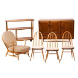 Ercol light ash and beech furniture comprising, a sideboard with a pair of cupboard doors over a