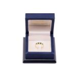 An emerald and diamond pendant necklace and an emerald and diamond ring set in 18ct gold, the ring