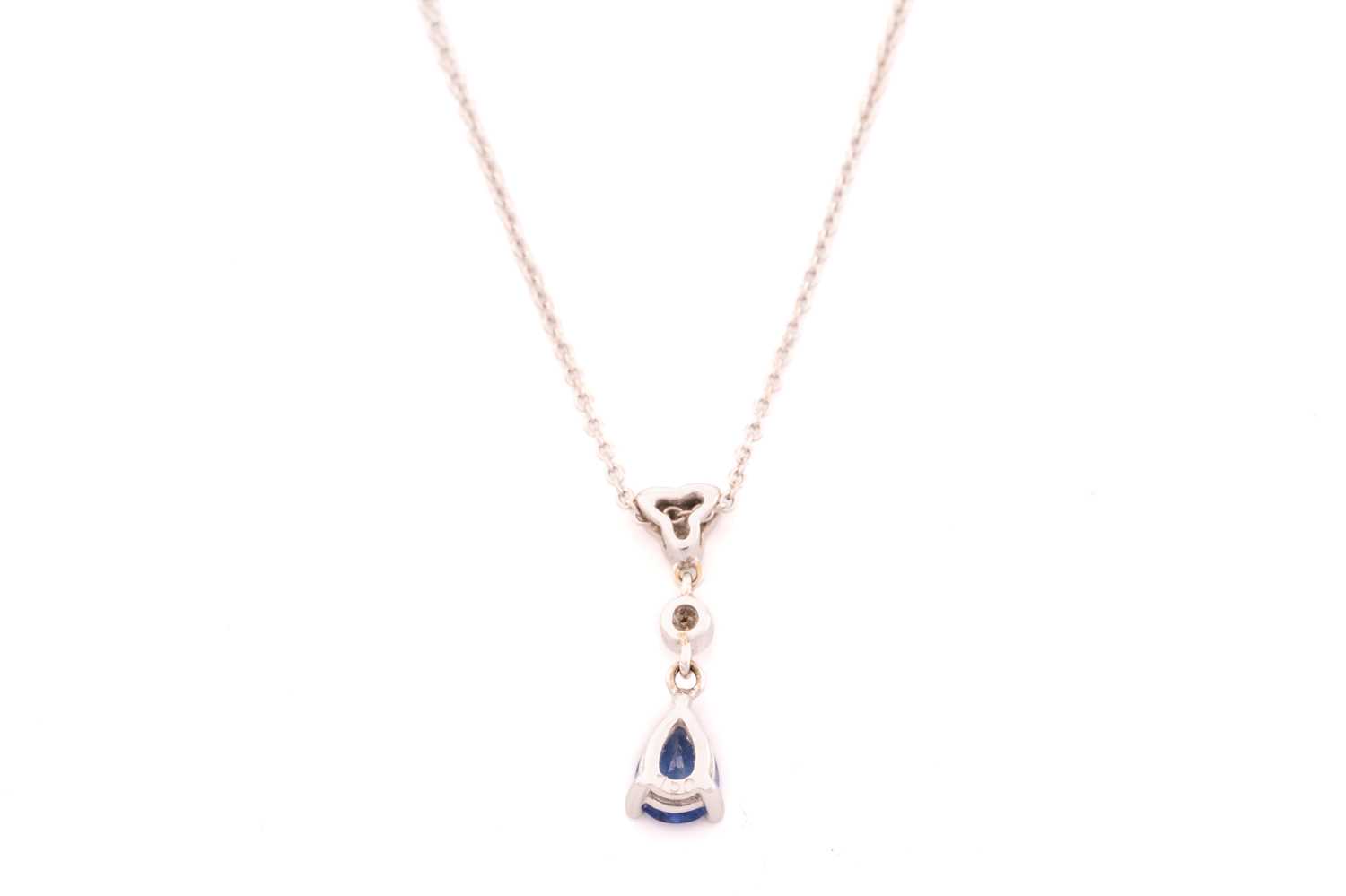 A sapphire and diamond necklace and earrings en-suite; the necklace comprises a pear-shaped sapphire - Image 4 of 8
