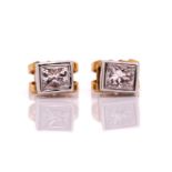 A pair of princess cut diamond ear studs, approximately 0.62cts, rub over set in 18ct, overall 5.2mm