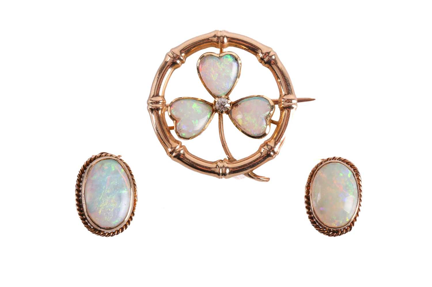 A precious opal clover brooch and a pair of earrings; the brooch of clover design constructed by