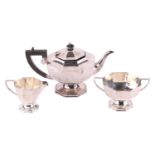 A late George V silver three piece tea set, makers initials R G & S, Sheffield 1935, of octagonal