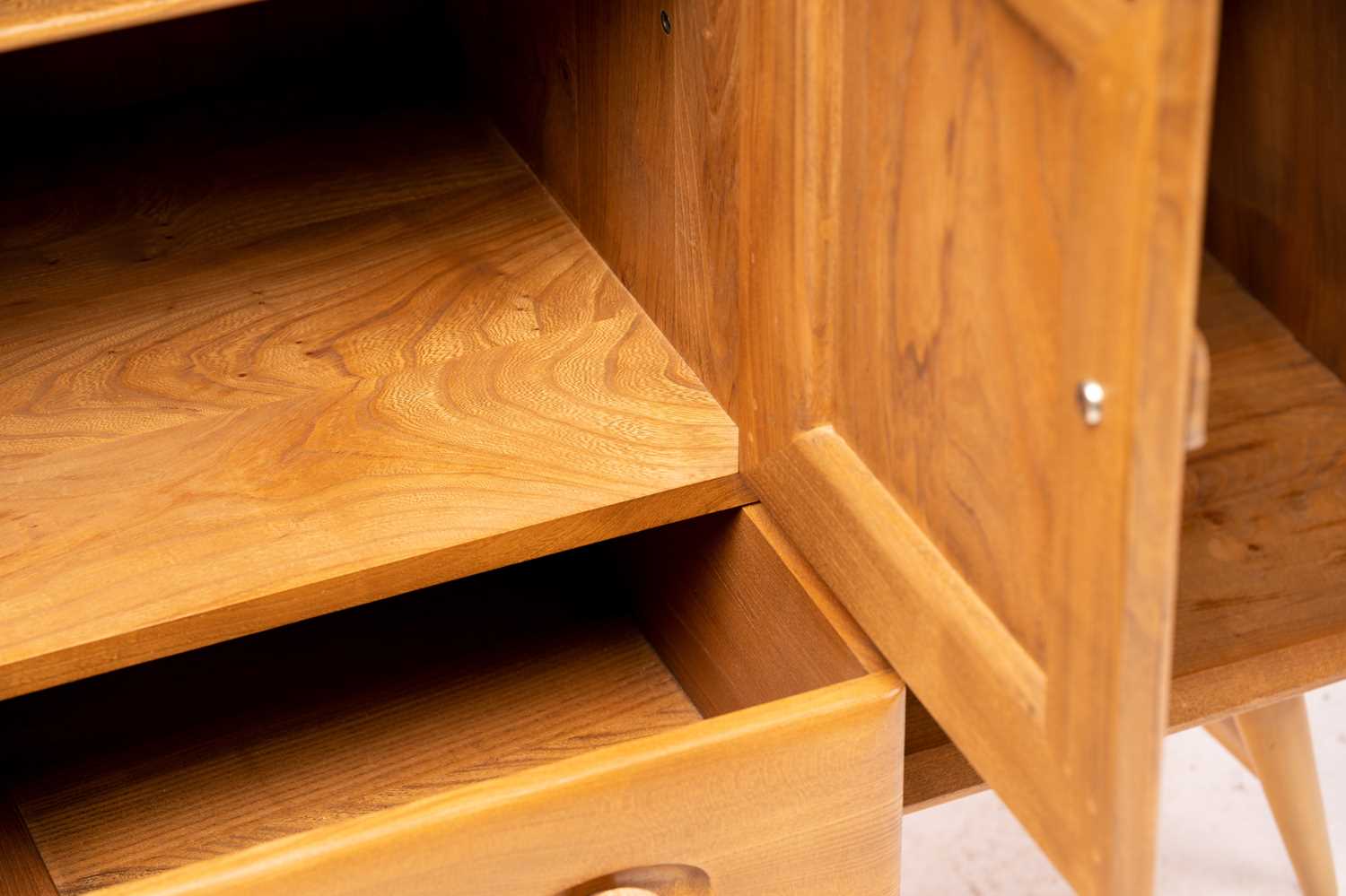 Ercol light ash and beech furniture comprising, a sideboard with a pair of cupboard doors over a - Image 10 of 39