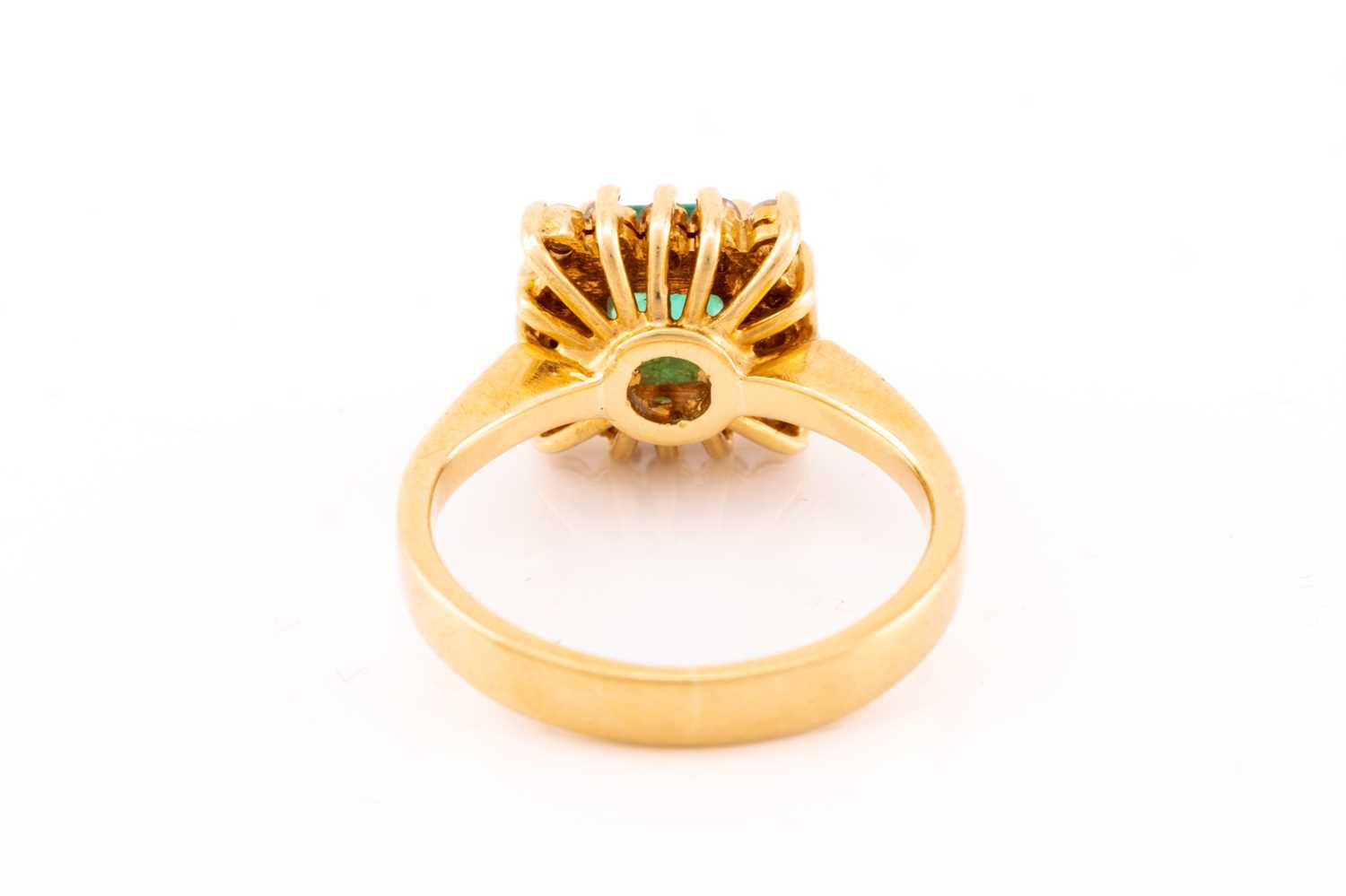 An emerald and diamond entourage ring, centred with an emerald-cut emerald in bright green colour, - Image 4 of 5