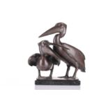 After Helmut Diller (1911 - 1984), a bronze figure of two pelicans, on a rectangular marble base.