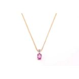 A pink sapphire and diamond pendant and chain, the oval mixed cut pink sapphire, approximately 1.