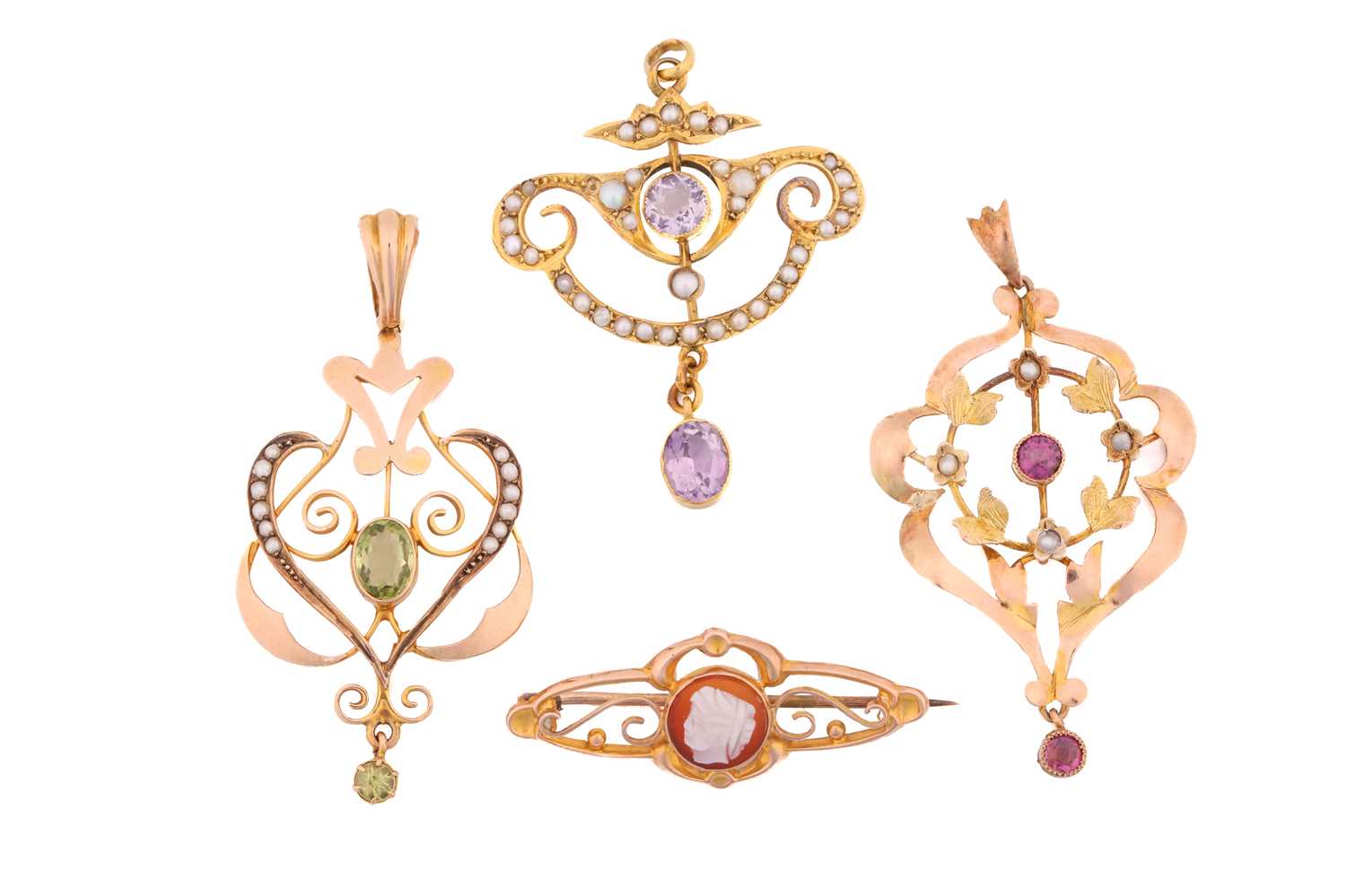 Three gem-set pendants and a cameo bar brooch; including an Edwardian scrolled pendant with floral