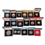A collection of seventeen boxed proof silver coins/proofs including; Falkland Islands Prince &