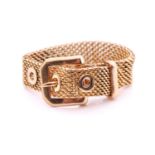 An adjustable belt and buckle ring, with a flexible mesh belt, fastened with a buckle clasp