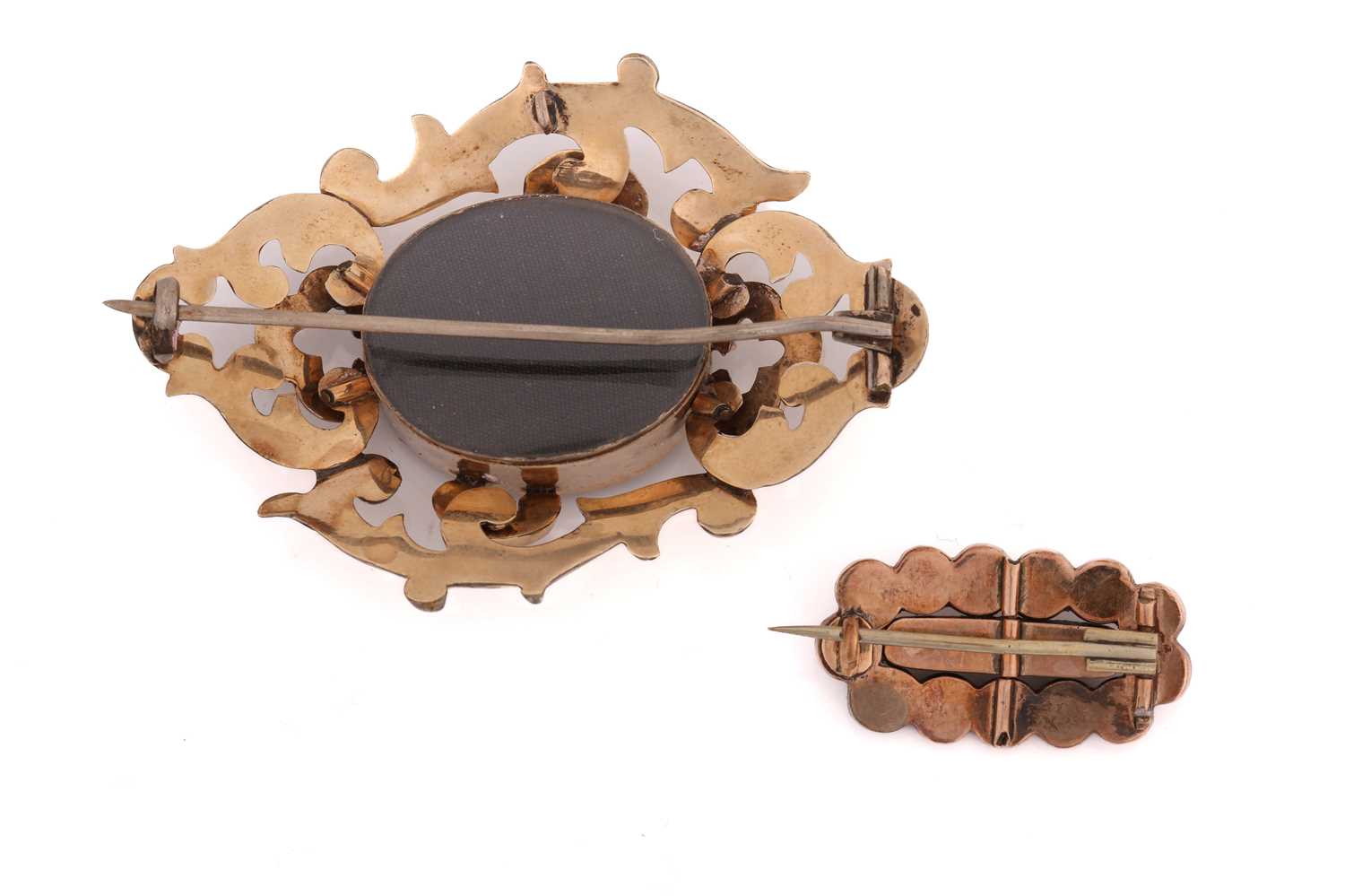 Two early 19th-century brooches; including a mourning brooch with a double glass compartment, - Image 2 of 2