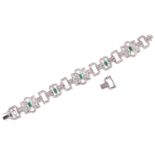 An Art Deco-style emerald and diamond bracelet, designed as geometric openwork links, encrusted with