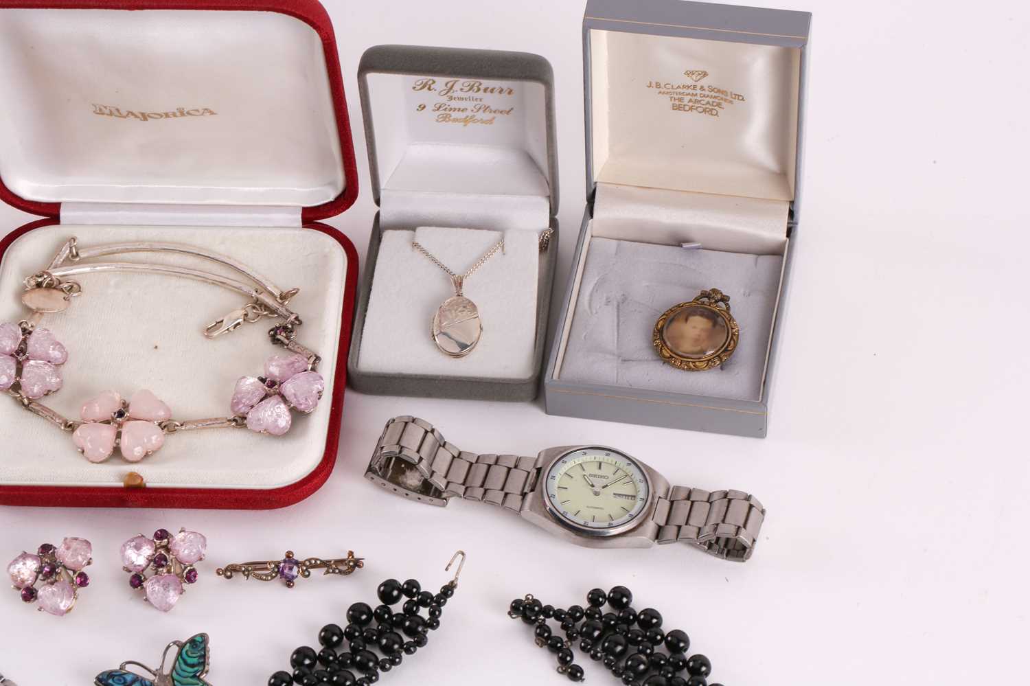 A mixed quantity of silver, costume jewellery and watches, including a silver bookmark decorated - Image 4 of 5