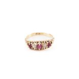 A five-stone half-hoop ring set with rubies and diamonds, comprising three circular-cut rubies