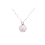 A south sea pearl necklace, featuring a round white silver south sea pearl of 13.6 mm, attached to a