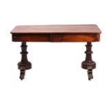 A William IV rosewood writing desk, the rectangular top over two frieze drawers, on fluted turned