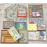 10 div. Spiele, Puzzles, Baukästen und 2 Spielpläne.