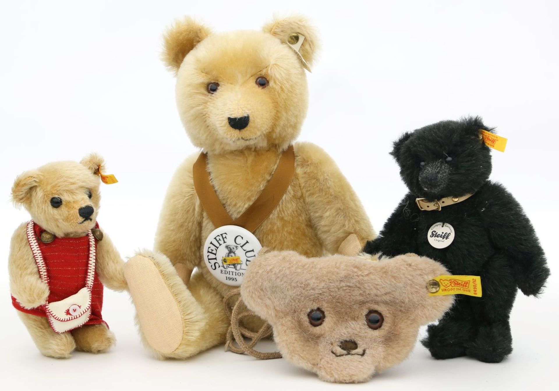 3 Steiff-Teddys und -Portemonnaie.