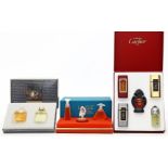 3 Parfum-Miniaturen-Sets, Lalique und Cartier.