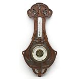 Jugendstil-Barometer mit Thermometer.