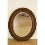 Ovale spiegel in gestoken houten lijst