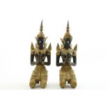 Stel bronzen knielende tempelwachters
