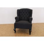 Moderen oorfauteuil met grijze bekleding