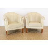 Stel creme lederen clubfauteuils