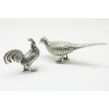 Stel zilveren flacons: haan en fazant