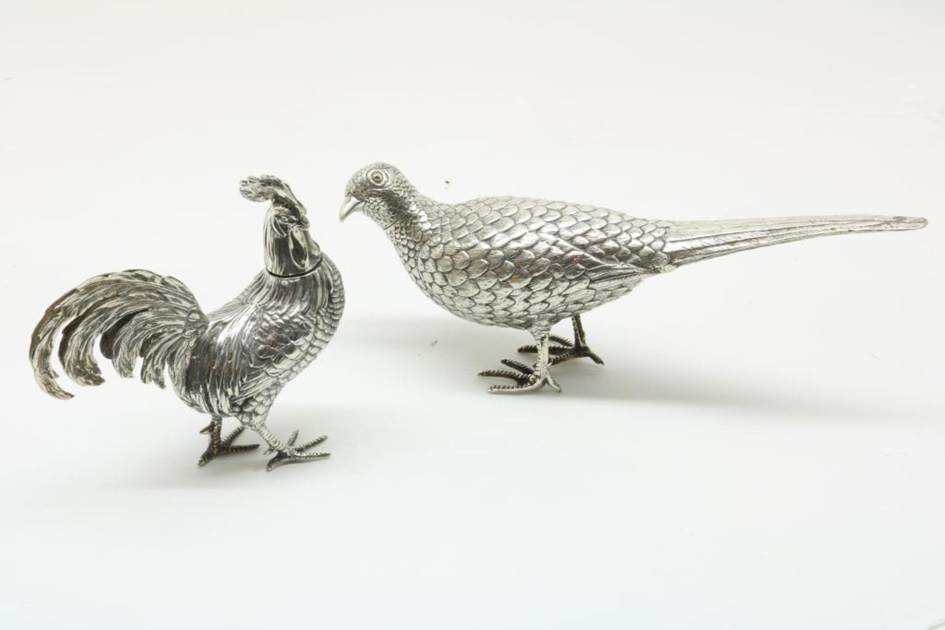 Stel zilveren flacons: haan en fazant